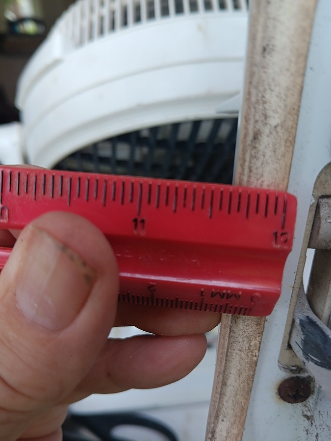 pic 2 wt ruler of width, on window frame